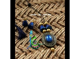 Dark blue oval pendent with black rope simple terracotta jewellery from linga Creations